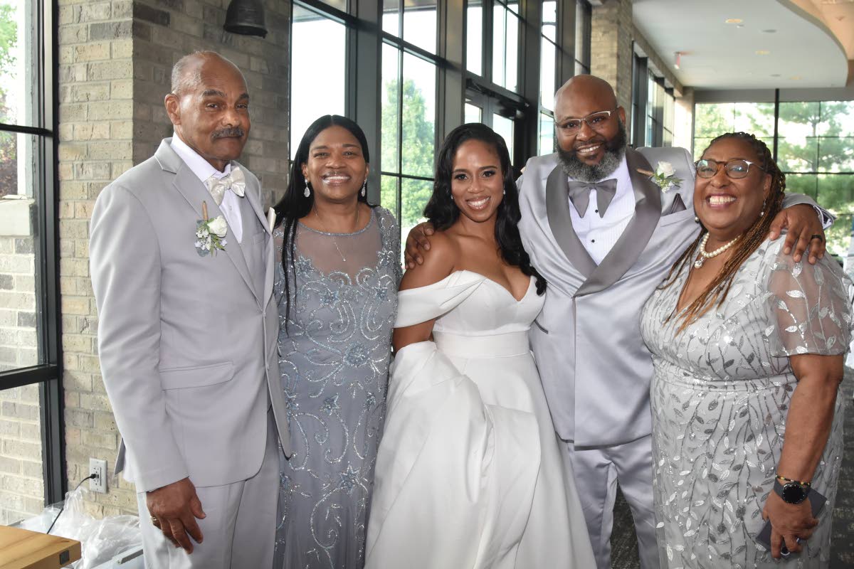 Michael (second right) and wife Yvonne (centre) pictured with their parents, (from left) Albert and Lori Dobi, parents of the bride, and Joy Robinson, mother of the groom.