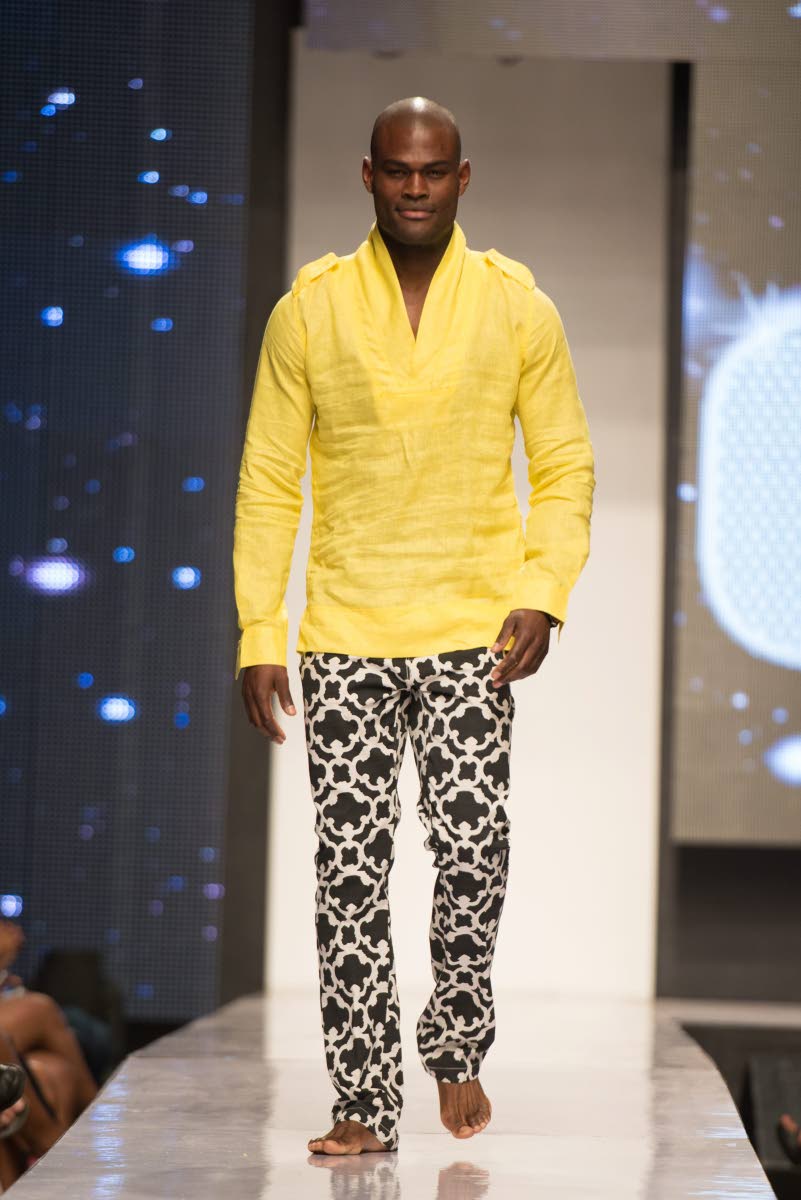 In this March 2014 photo, a model walks the runway in a creation by Designs by Marc Limited.