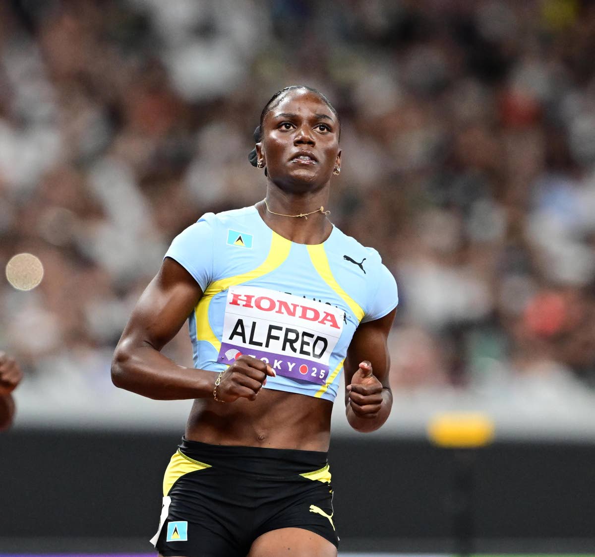 St Lucia’s Julien Alfred looks the picture of composure during the heats of the 100 metres at the World Athletics Championships inside the Japan National Stadium in Tokyo yesterday.