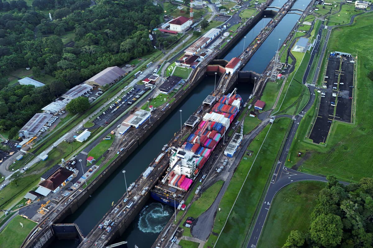 A cargo ship traverses the Agua Clara Locks of the Panama Canal in Colon, Panama.