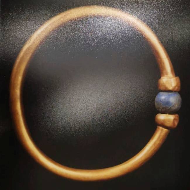 This undated photo provided by Egypt's Ministry of Tourism and Antiquities shows a 3,000-year-old bracelet that belonged to an ancient Pharaoh, which was stolen from Cairo's famed Egyptian Museum and then melted down for gold.