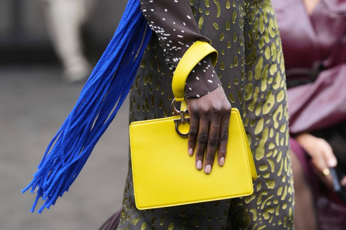 The chartreuse mini bag adds a pop of colour in Look 10 from the collection. 
