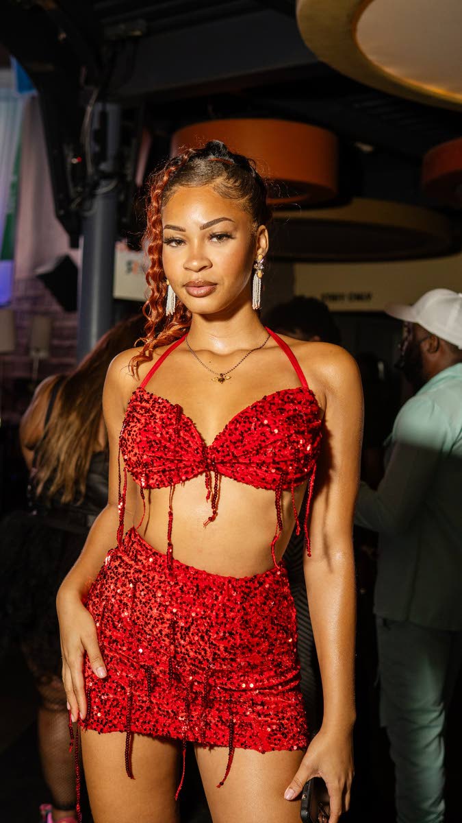 AnnaleaX turned heads during her performance in this fiery red skirt set. 