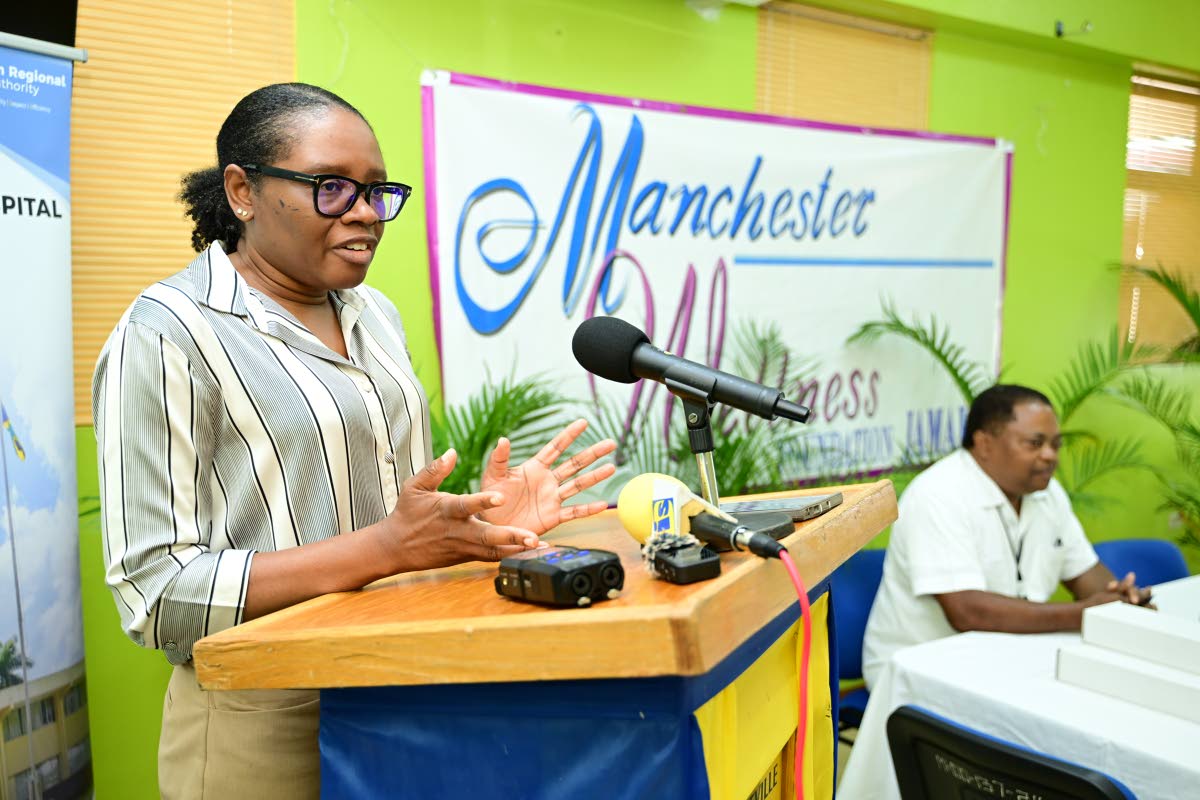  Urology Consultant at the Mandeville Regional Hospital, Dr. Davon Mitchell, addresses a ceremony for the handover of urology equipment valued at over $21 million, to the hospital on Friday. The instruments were donated by the Manchester Wellness Foundatio