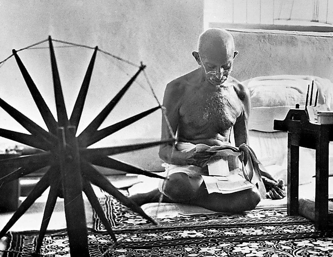 In this photo Gandhi is seen with the ‘charkha’ or the spinning wheel. 