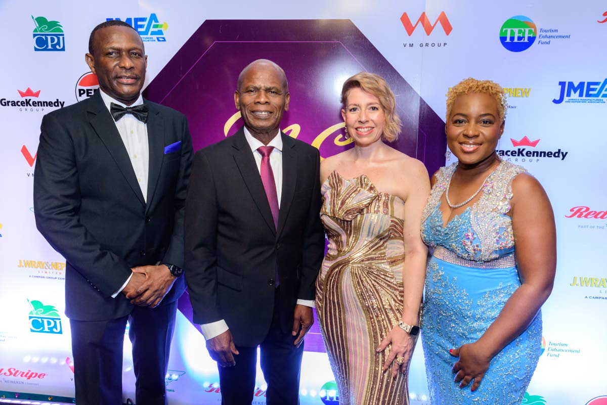 From left: JMEA Deputy President Cecil Foster; Custos of Kingston Steadman Fuller; JMEA President Kathryn Silvera; and JMEA Executive Director Kamesha Blake, on the M&E Awards red carpet.