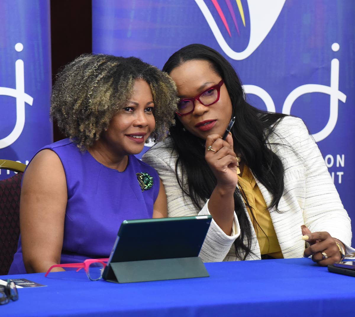 Dr Kasan Troupe (right), permanent secretary in the Ministry of Education, Skills, Youth and Information, and Minister of Education, Skills, Youth and Information, Senator Dr Dana Morris-Dixon.