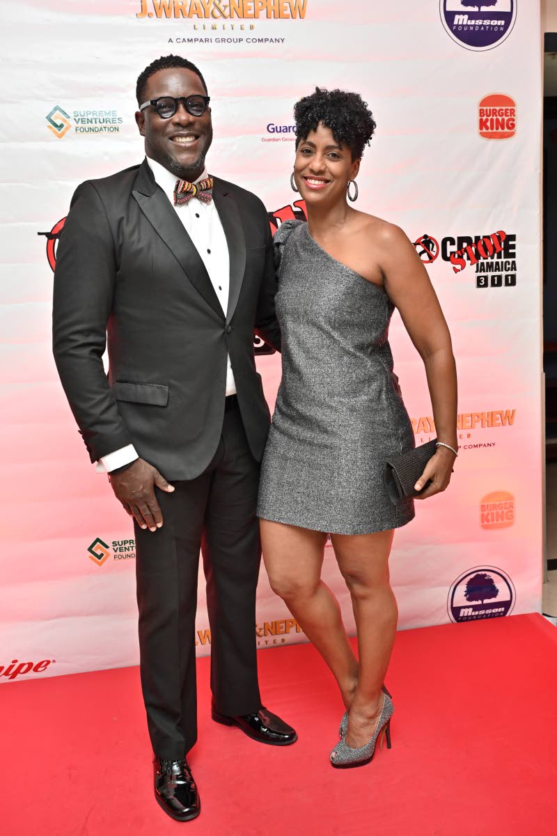 Stephen Price (left), vice-president and general manager of Flow, with his wife Imani Duncan-Price, director and office leader, Deloitte Jamaica