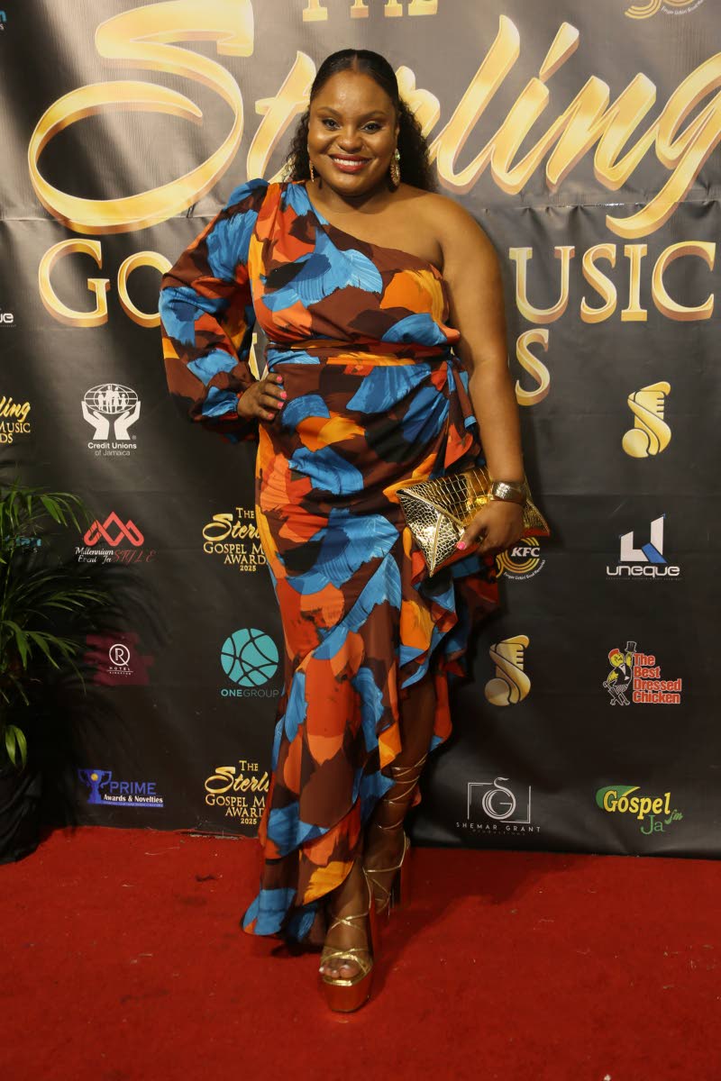 Jodian Pantry serves fresh style in a one-shoulder faux wrap dress, brought together with a gold clutch and strappy platform heels.