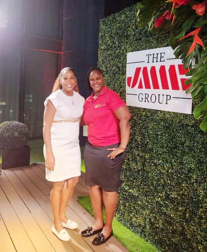 Shani Duncan-Falconer (left), senior corporate manager at JMMB Group SME Resource Centre, with Primrose Oliver of Called Out Gospel Radio, during the PowHerful Women in Business Meet & Greet at AC Hotel, Kingston. 