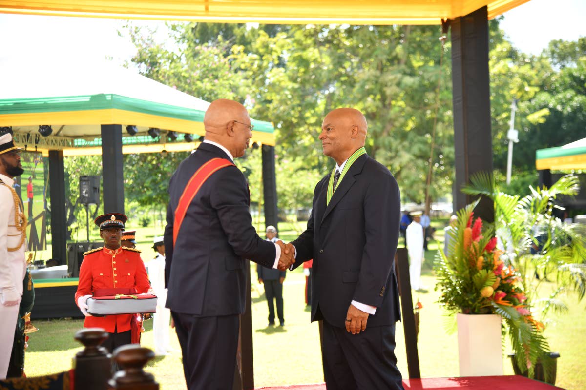 Lloyd Carney, recipient of membership in the Order of Distinction in the rank of Commander for contribution to academia and philanthropy with Governor General Sir Patrick Allen during the Ceremony of Investiture and Presentation of National Honours and Awa