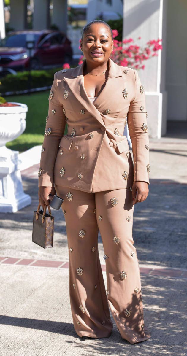 Representing Opposition Leader Mark Golding at the National Honours and Awards on Monday, Nekeisha Burchell, member of parliament for St James Southern, stuns in a nude-tone pantsuit adorned with dazzling embellishments.