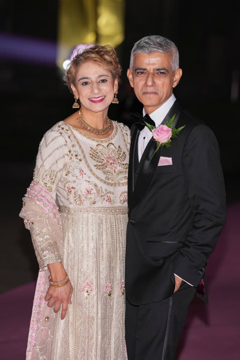 Mayor of London Sadiq Khan (right) and wife, Saadiya Khan, pose for photographers upon arrival at the British Museum Ball in London on Saturday.