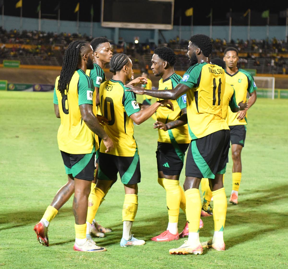 
Jamaica’s Bobby Reid (third left) celebrates opening the scoring against Bermuda during the Reggae Boyz’s 4-0 Concacaf World Cup Qualification victory at the National Stadium on October 14.