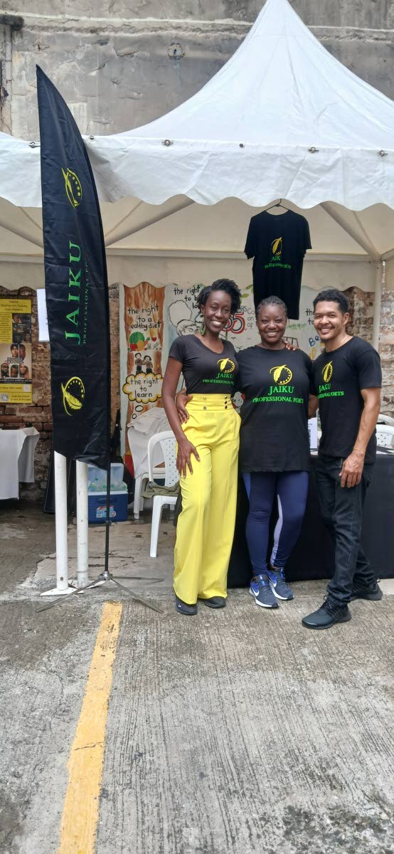 From left: Poet Kacy Garvey, co-founder and managing director of JAIKU; Jodiann Edwards, executive assistant; and poet Britton Wright, co-founder of JAIKU; at Kingston Creative’s ‘Demo Day’ on Sunday, September 28, in downtown Kingston.