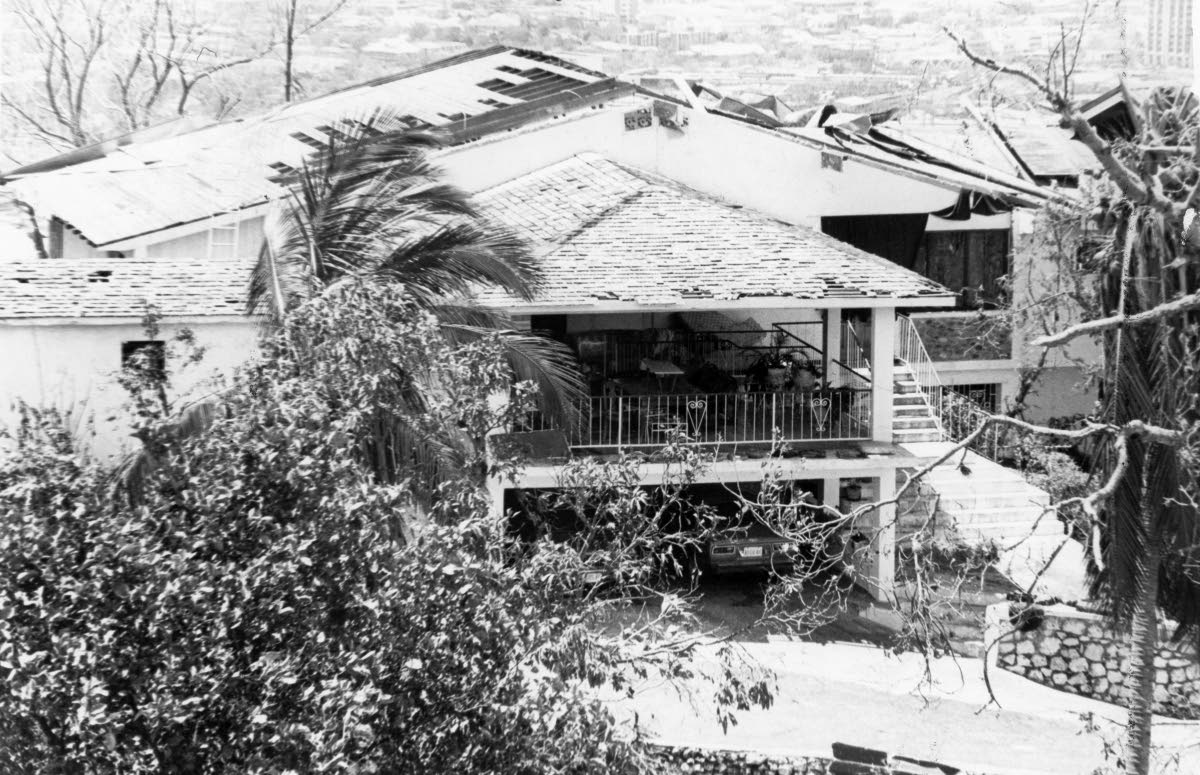 Roofs damaged by Hurricane Gilbert on September 12, 1988.