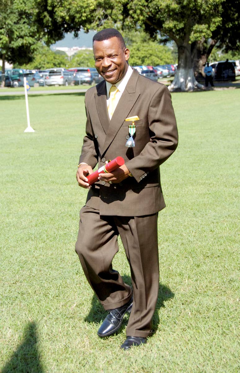 In this 2010 file photo, the Boogieman Barrington ‘Barry G’ Gordon smiles proudly after being appointed a member of the Order of Distinction, Officer class.