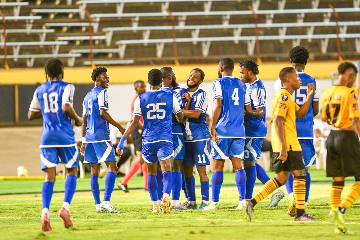 
Mount Pleasant Football Academy players celebrating a goal during the Concacaf Caribbean Cup football match against O & M Football Club at the National Stadium, Kingston on September 30.