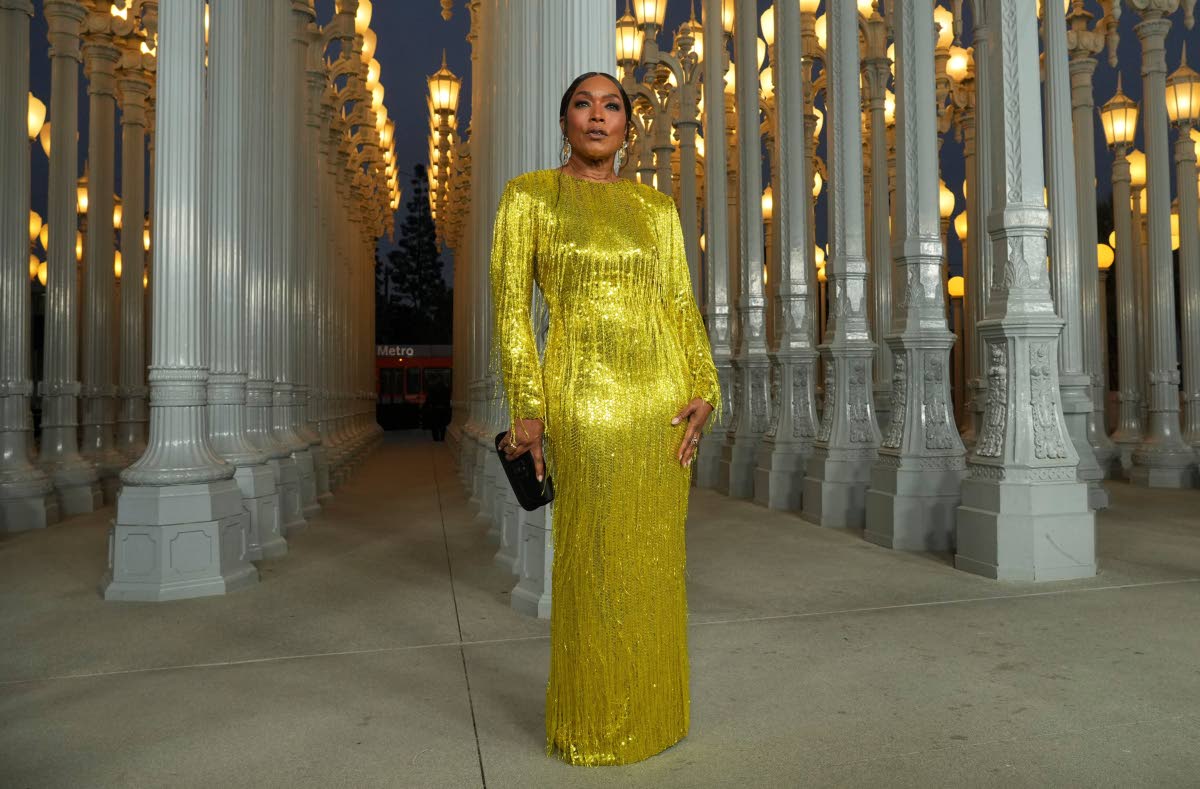 Angela Bassett stuns in a sparkling fringe Gucci gown. 