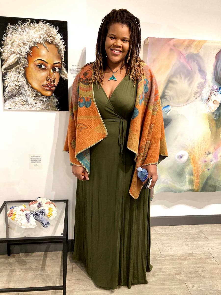 Jamaican ceramic ocean activist artist, Anna-K Cuffe, with her pieces at the second Art in Motion exhibition titled ‘Eco Art Expressions’ held at Withrow Common Gallery at Exhibition Place in Toronto.