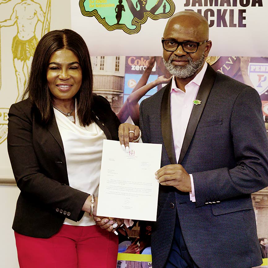 Jamaica’s Consul General to New York, Alsion Roach-Wilson, with Irwine Clare, CEO of Team Jamaica Bickle.