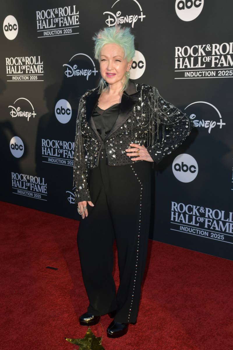 ‘Girls Just Wanna Have Fun’ and get inducted into the Rock & Roll Hall of Fame. Cyndi Lauper walked the red carpet in a bejewelled black suit and her cropped, pale green-blue pixie.