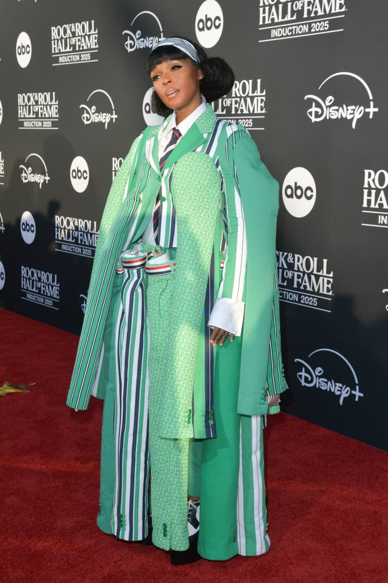 Above: Janelle Monae wears an out-of-this-world Thom Browne suit, straight off the runway. 
