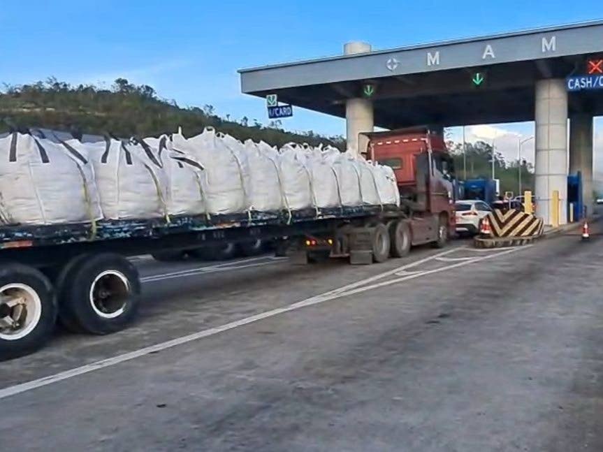 An ODPEM convoy at toll booth at Mammee Bay, St Ann, delivering relief supplies to storm‑hit parishes.