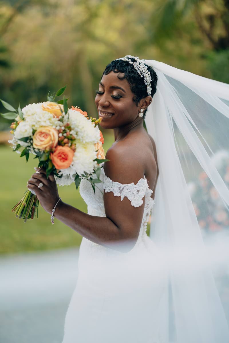 With bouquet in hand, Samantha give new meaning to bridal enchantment.