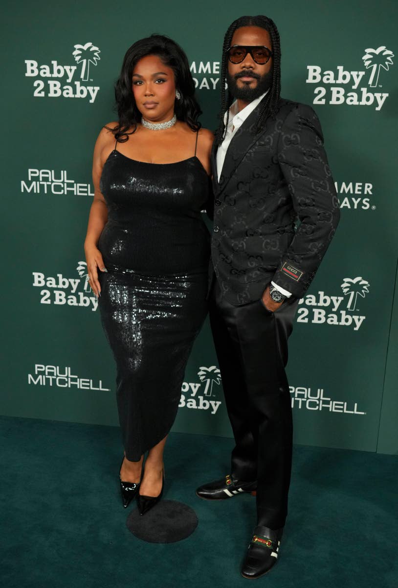 Lizzo brings her beau Myke Wright as her plus-one for the evening.