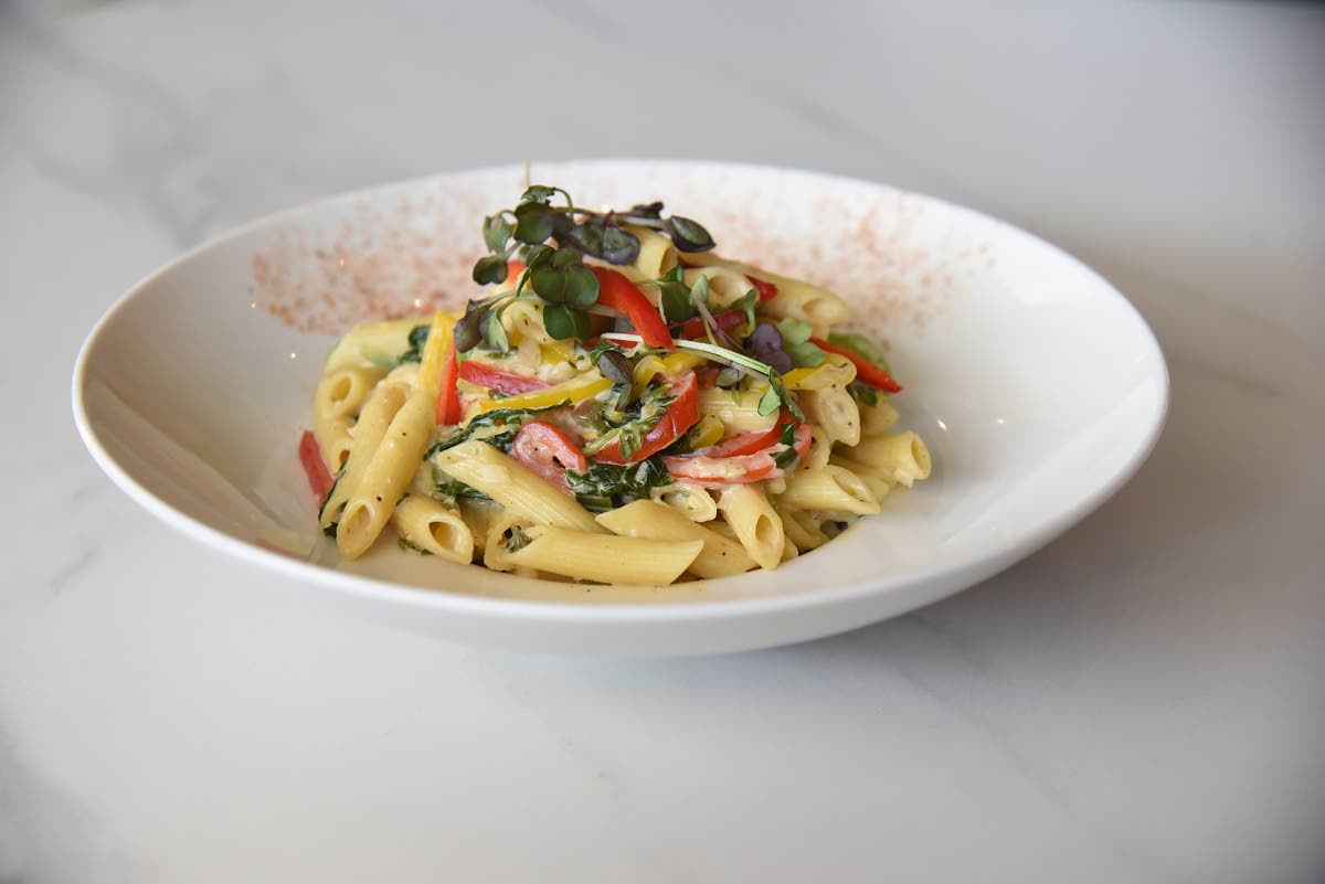 The Rasta pasta relief is a vegetarian option served with sweet peppers, callaloo and coconut cream sauce.