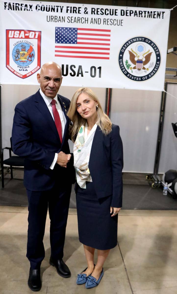 Jamaica’s Ambassador to the United States, Major General (Ret’d) Antony Anderson is greeted by United States Under Secretary of State for Public Diplomacy, Sarah B. Rogers.