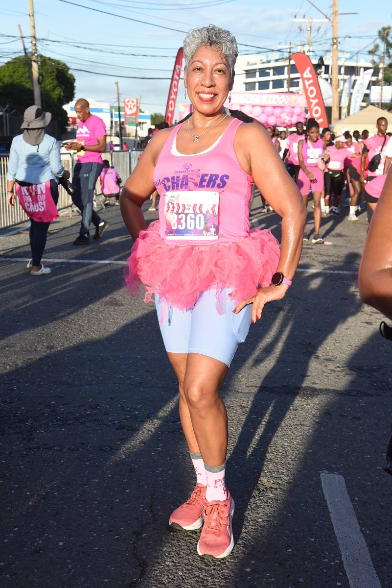 Right: Feeling good after crossing the finish line, Keisha Cross is all smiles.