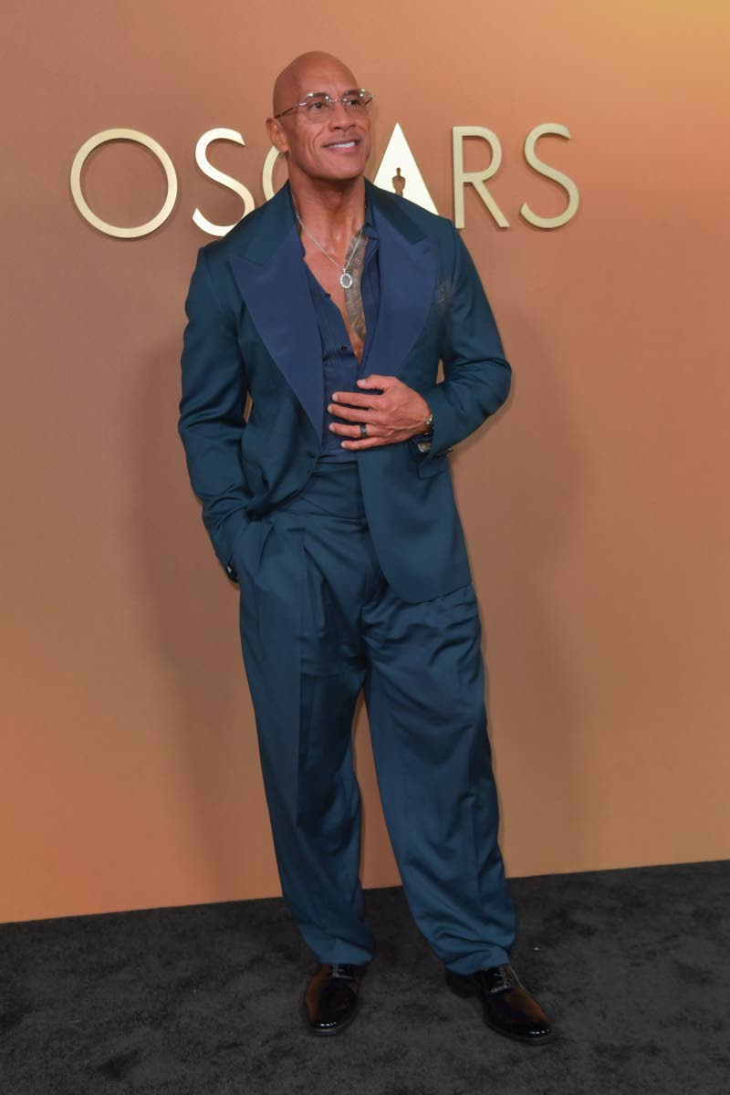 The Rock himself, Dwayne Johnson, owns the black carpet in a minimalist, perfectly tailored pick.