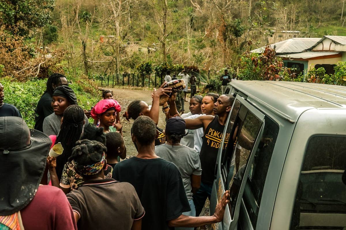 Randy Griffiths and team hand out supplies.
