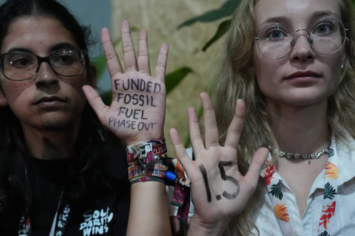 Activists participate in a demonstration outside where negotiations were taking place at the COP30 UN Climate Summit, on November 21, in Belém, Brazil.