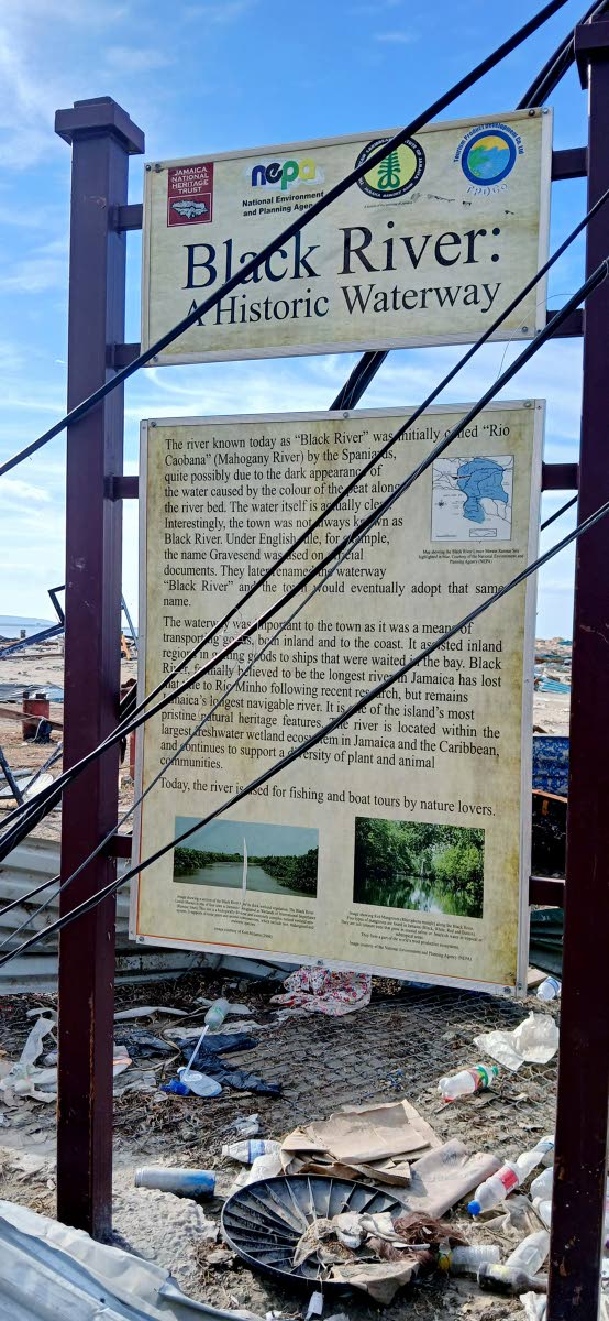 The storyboard of the history of Black River is still standing after Hurricane Melissa.