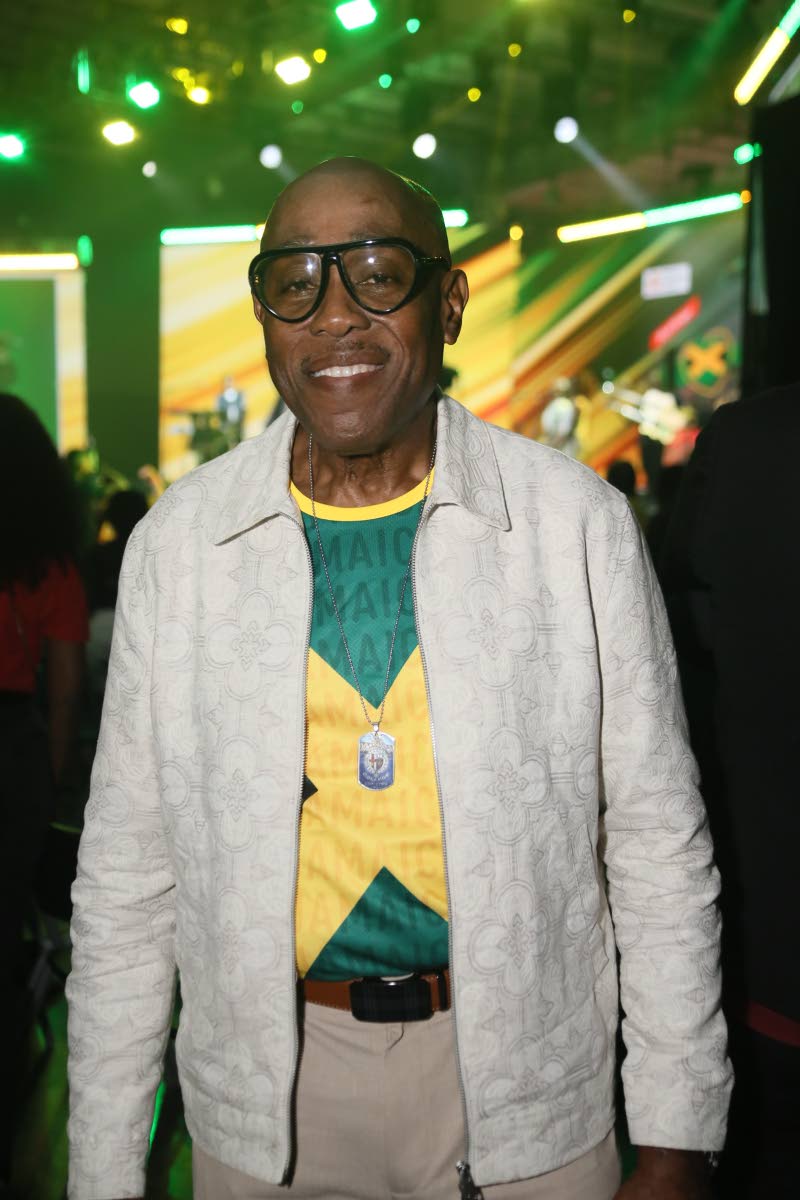 Ian Forbes, custos of St Andrew, soaks up the lively atmosphere inside the National Indoors Sports Centre.