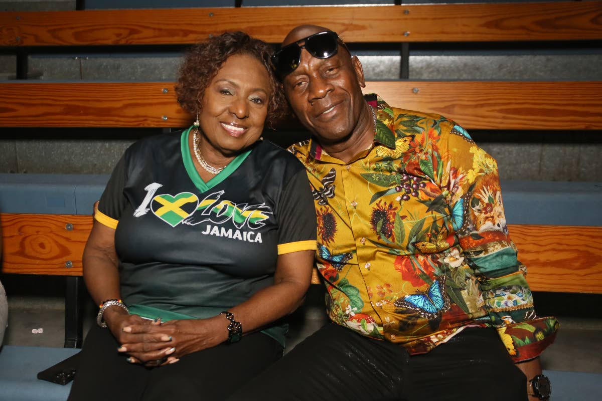 Pausing their confab for a quick photo are Olivia ‘Babsy’ Grange, minister of culture, gender, entertainment and sport, and reggae singer George Nooks.