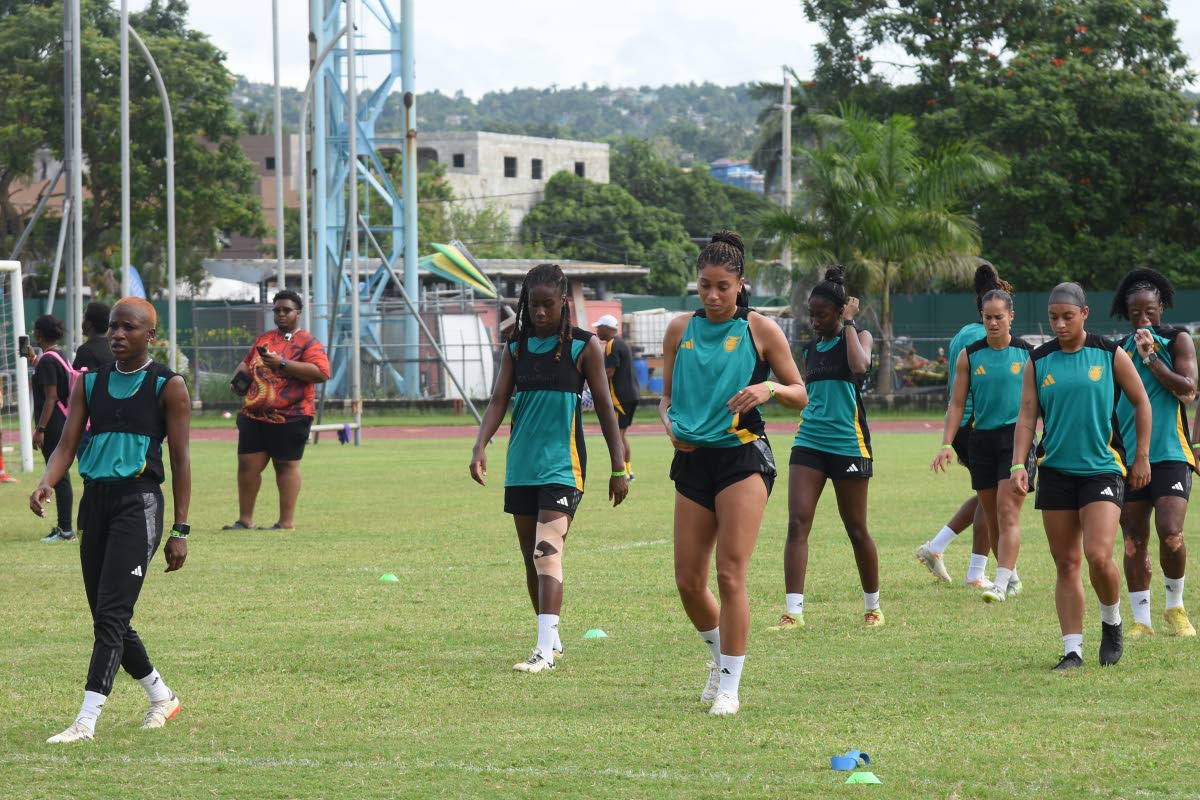 Reggae Girlz warm up ahead of a training session at the Montego Bay Sports Complex last year.