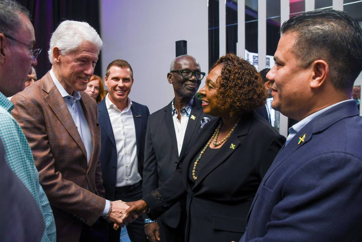 Minister Olivia Grange, who is charge of the Jamaican Government, meets with former United States President Bill Clinton in St Andrew on December 4, 2025 to discuss potential partnership with the Clinton Foundation in support of Hurricane Melissa recovery 