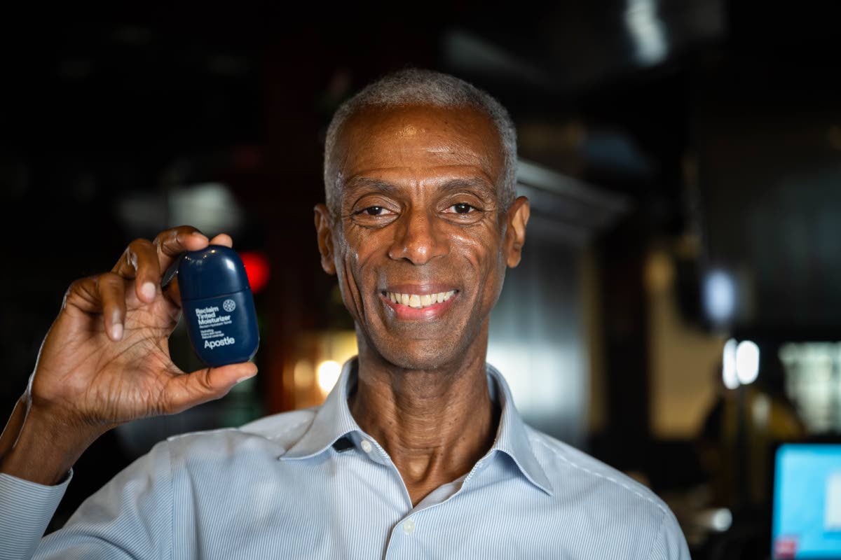 Photos by Gladstone Taylor/Multimedia Photo Editor 
Apostle co-founder and make-up master Jamie Melbourne proudly displays the Reclaim Tinted Moisturiser during a sit- down with ‘Sunday Lifestyle’ at Mingles Bar and Lounge.