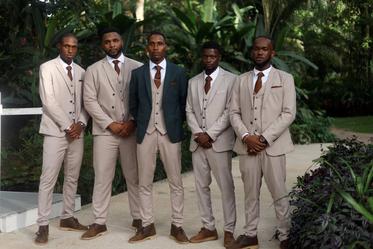 Bruce (centre) is flanked by his groomsmen (from left) Kevony Speid, Alvin King, Fitzroy Delaney, and Kayvon Richards.