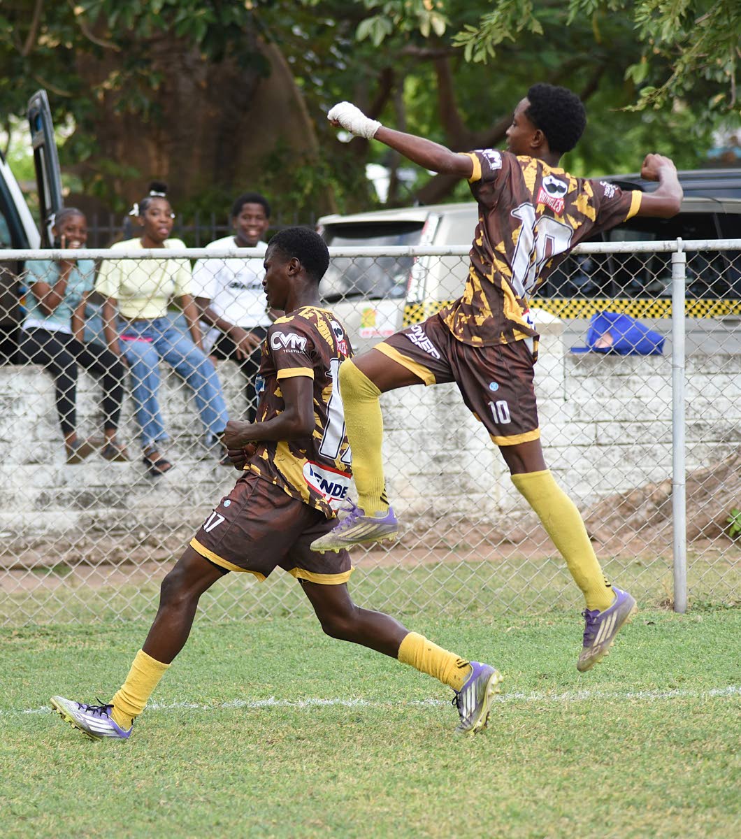 Charlie Smith’s Anthony Bryan (left) and Kevin Howeell celebrate the former’s goal against St Catherine High School in the ISSA/WATA Manning Cup round of 16 on November 29.