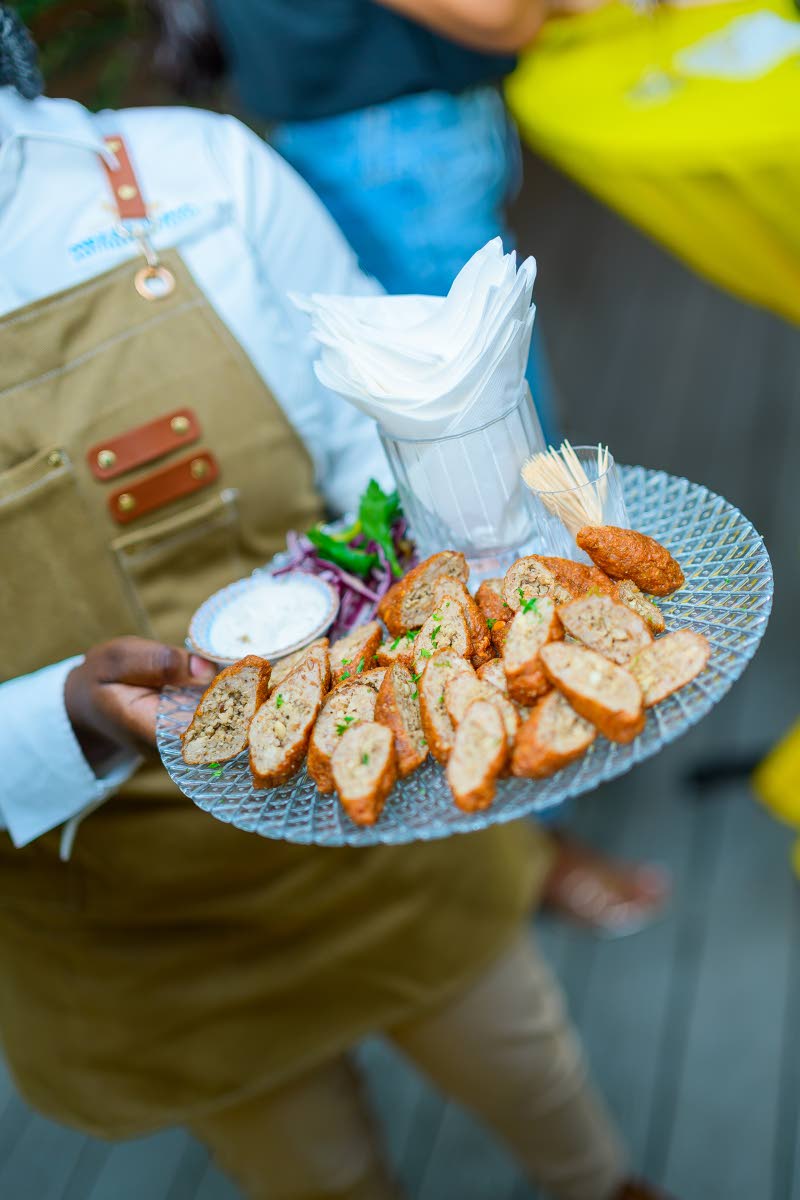 The chicken kibbeh offered a delicious twist on a Mediterranean classic, featuring a crisp outer shell and a tender, delicately spiced chicken filling, served with a cool dip for the perfect bite.