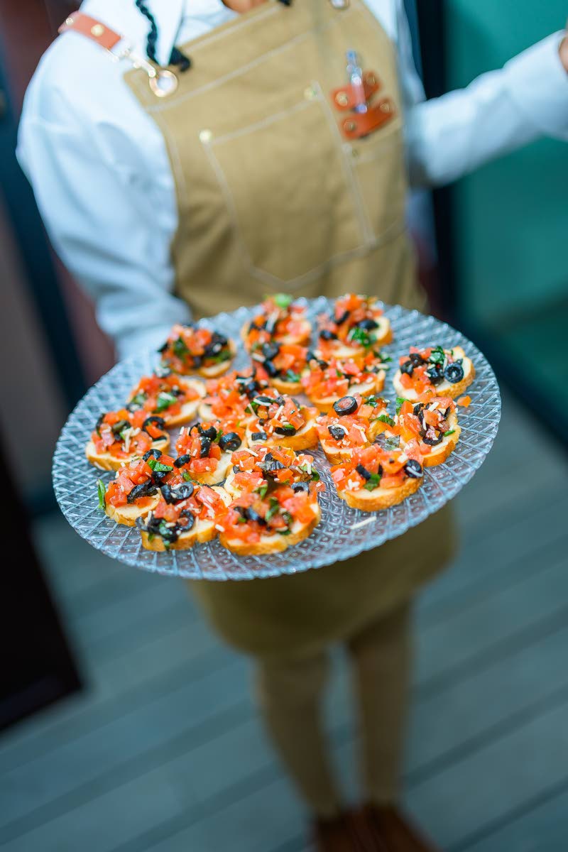 Fresh tomato bruschetta, topped with olives, basil, and a drizzle of olive oil, brought a burst of colour and flavour to the evening, served on crisp, toasted baguette slices.