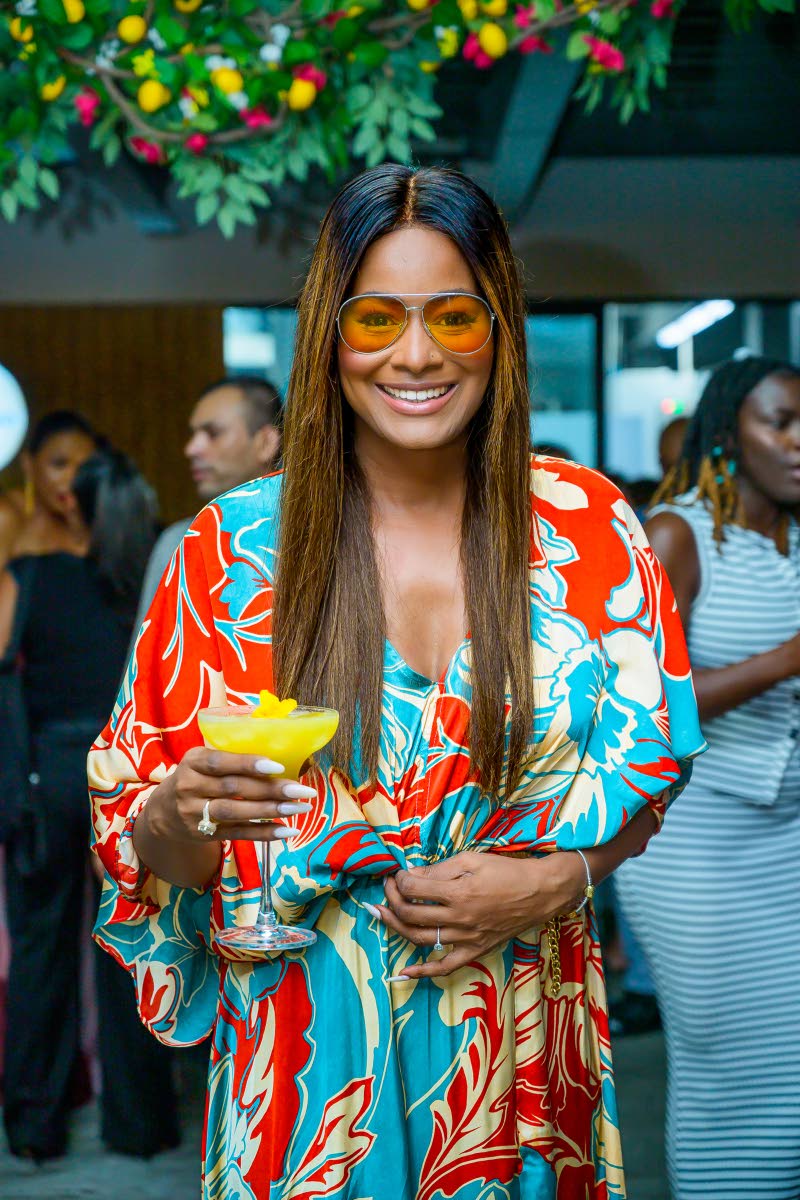 Tanya Lee Perkins, head of Leep Marketing, with the Santorini sunset cocktail. 