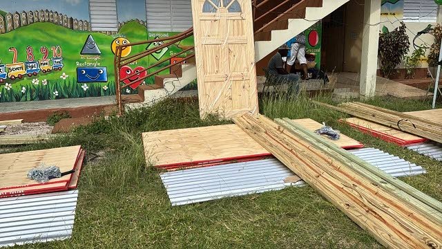 Construction supplies laid out in bundles at the Farm Heights United Basic School in  St James for distribution to residents of the community last Thursday, following the passage of Hurricane Melissa on October 28.