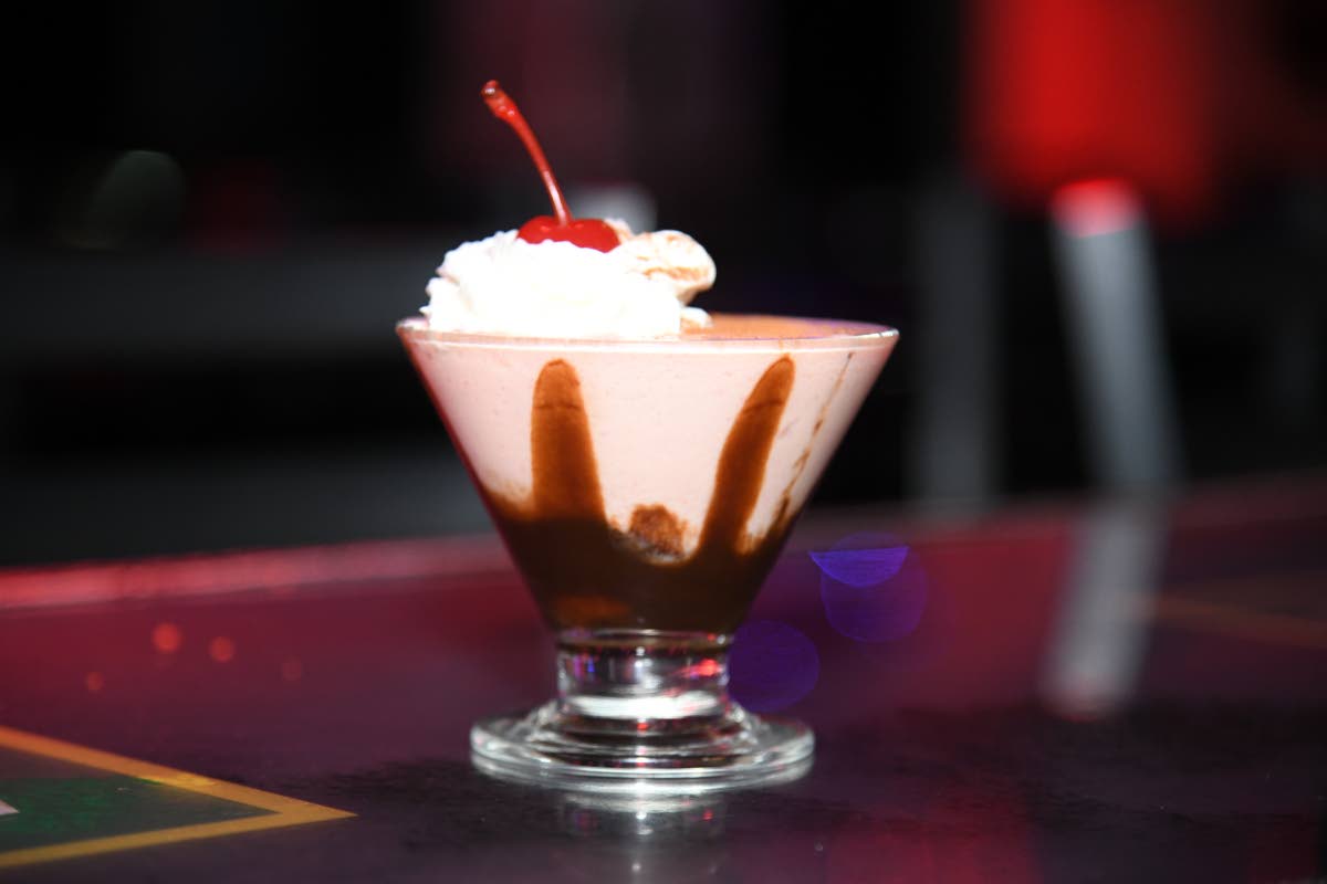 Served with whipped cream and a cherry on top, Santa's side sip is a main attraction for women who love creamy cocktails.
