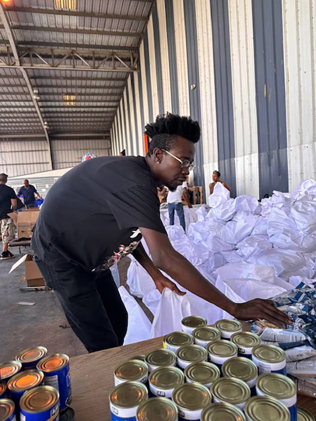 Working with the Sean Paul Foundation, Chi Ching Ching has helped package supplies with Food For The Poor Jamaica and travelled to south-western parishes to distribute food and care items.
